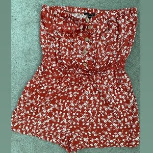 Terracotta colored floral print romper shorts